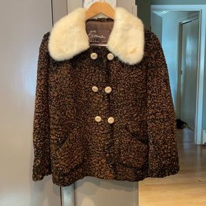 Vintage one of a kind brown curly lamb coat with cream mink collar. Size SM/MED.